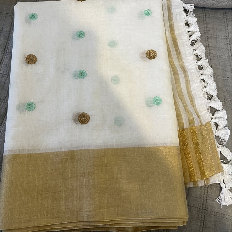 Off-White mul cotton saree with pista green and gold embroidery