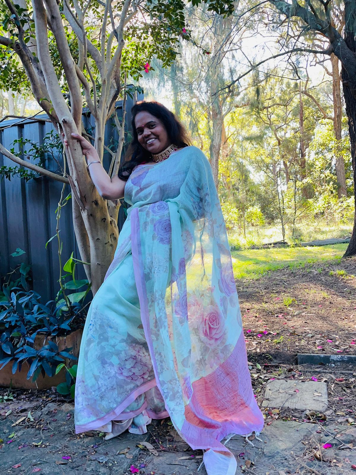 Pastel blue and pink Kora Linen Saree with Pichwai Artwork