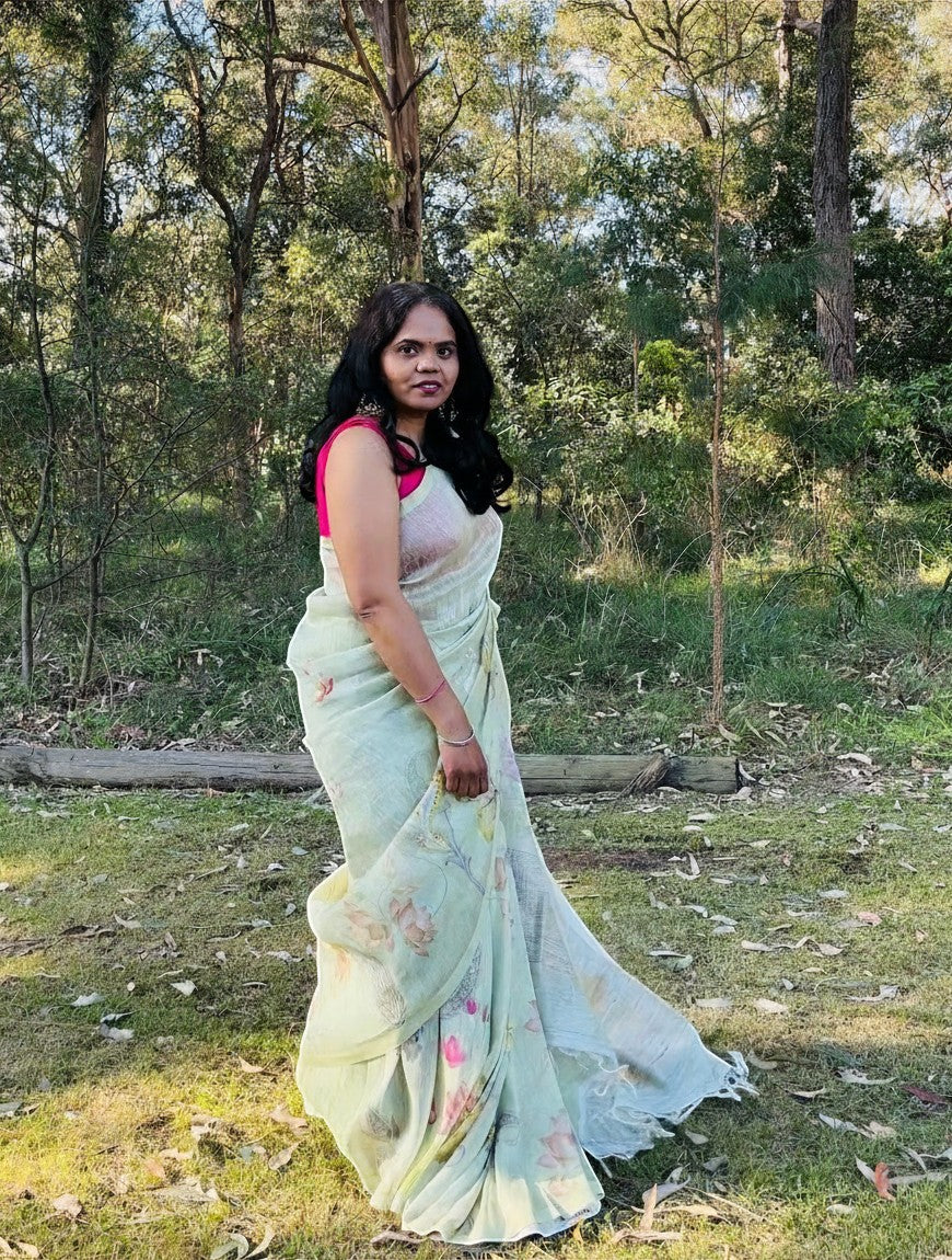 My Store Ujjala Pista Green Kora Linen Saree with Pichwai Artwork. Soft kora linen with floral print.