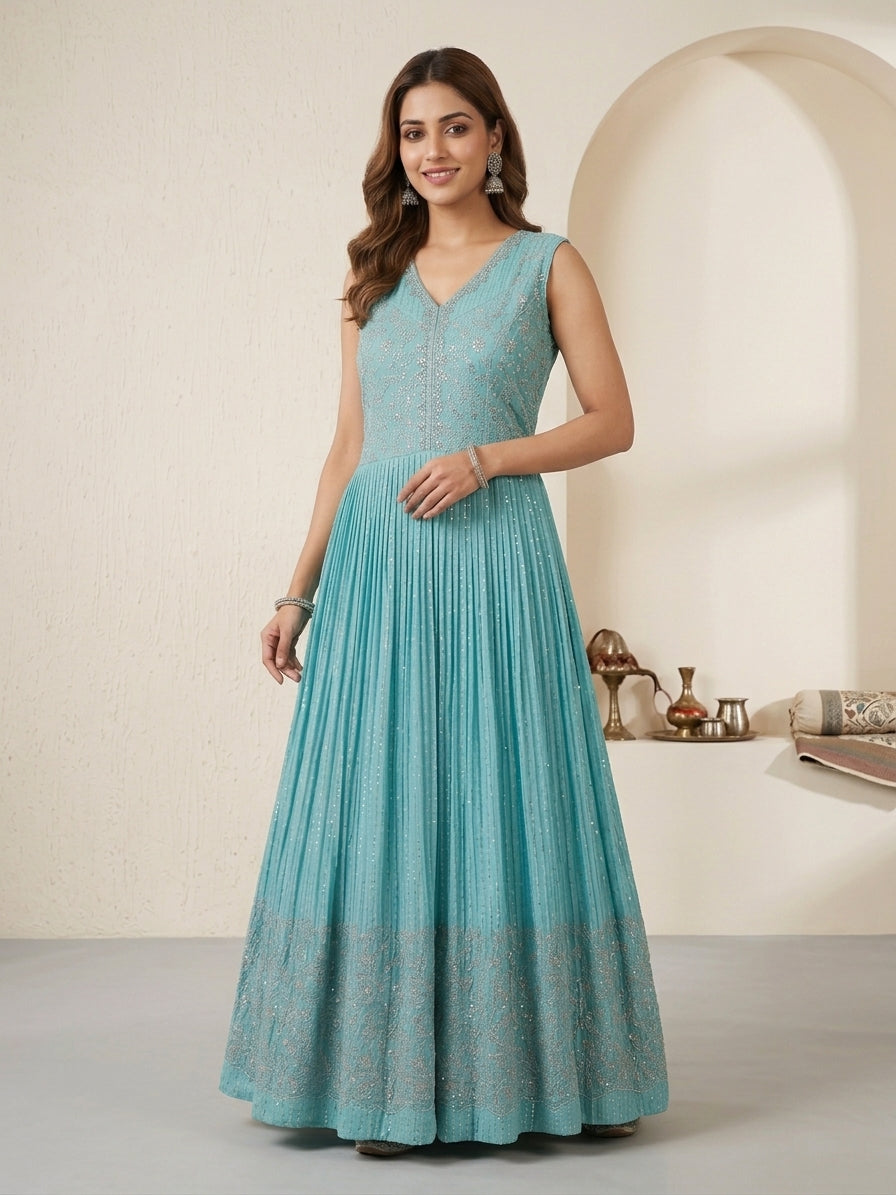Powder blue sequin embellished anarkali gown with pleated skirt, sleeveless festive party wear